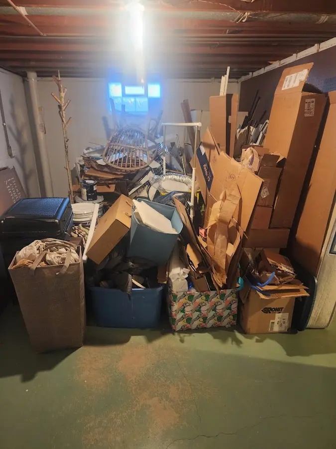 Roll-off dumpster container at job site for 15 Yard Dumpster Rental in Batesville